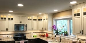 Image of a Kitchen Renovation with LED Potlights and Cabinet Lighting by exquisite electric