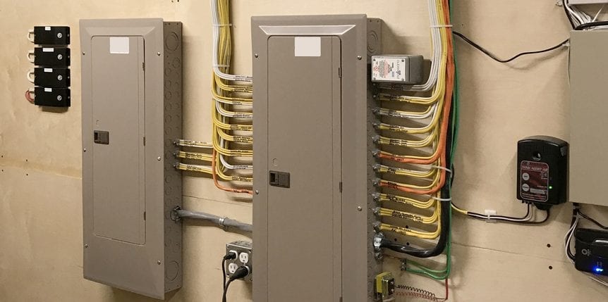 Image of Electrical Panels installed in a Residential Mechanical Room