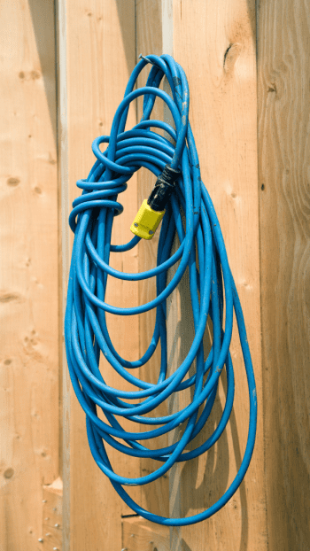 extension cord on a fence Image of Exquisite Electric Residential Electrician Bryan Fixing a Plug